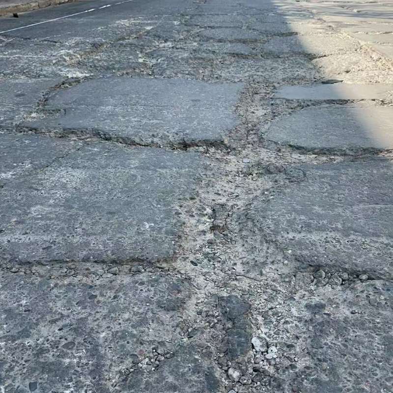 盘山路面起砂露石子修补料